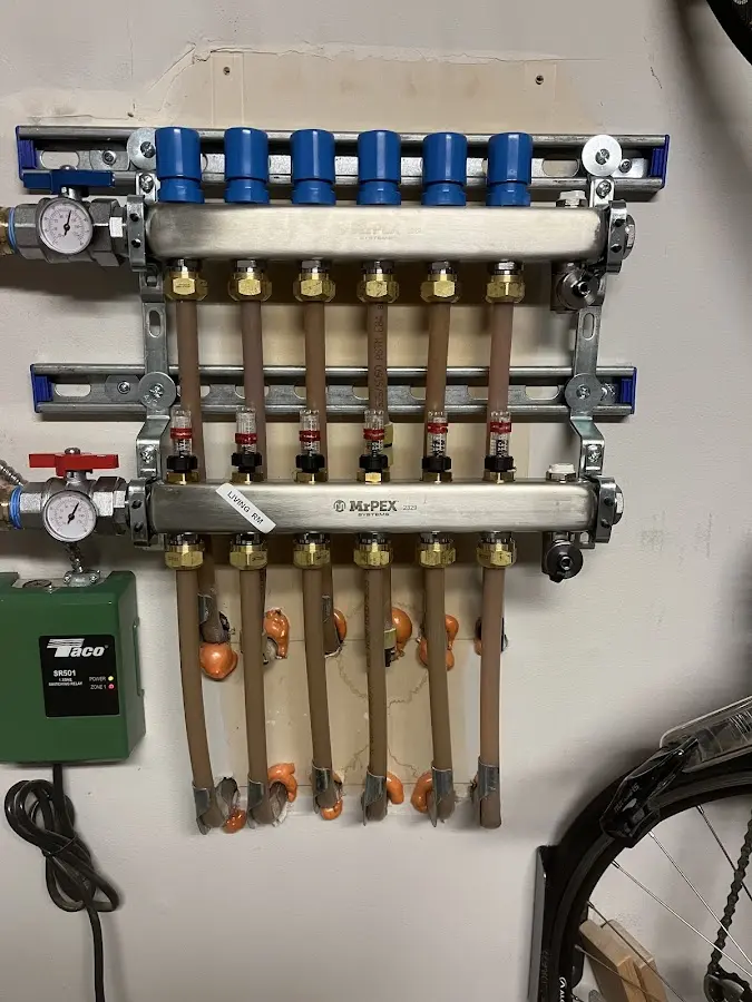 Plumber performing Water Heater Repair at a residential property in Coolbaugh